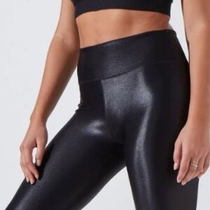 NEW - NOLI Glossy black leggings with a sleek finish. Size XS